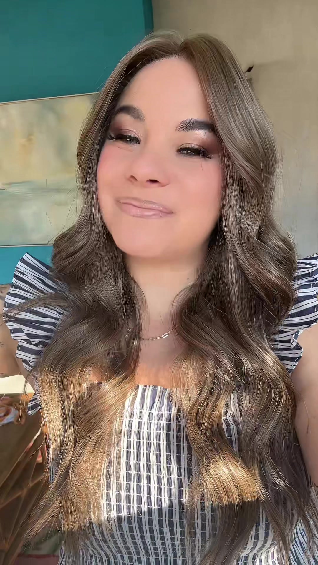 TikTok post by @elizabethwearswigs for Chelsey Smith Cosmetics. Caption reads: Mikayla smitten brunette from @Chelsey Smith....