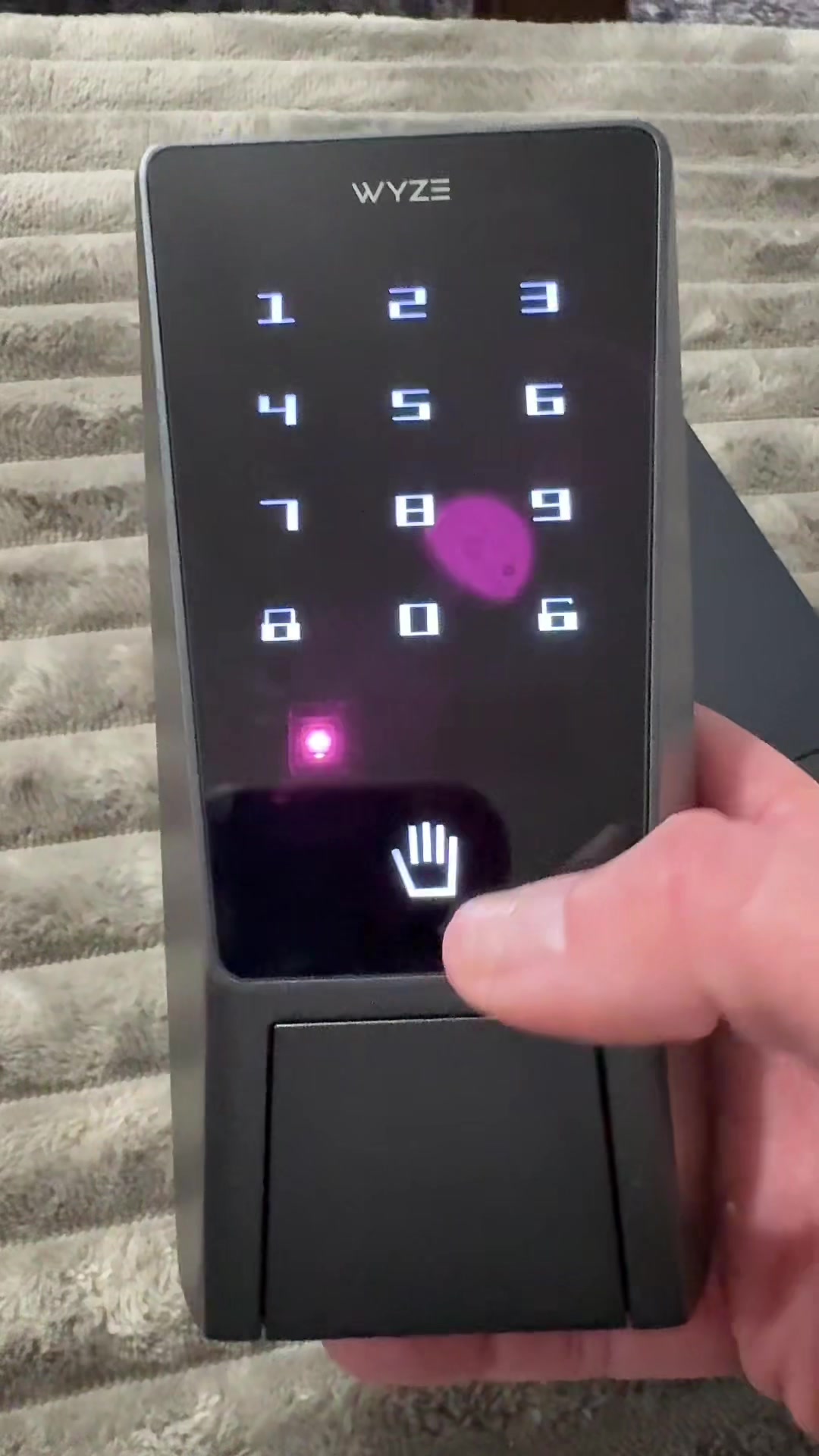TikTok post by @robinknepshield for Wyze. Caption reads: WYZE Palm Lock .. palm recognition door lock [...].
