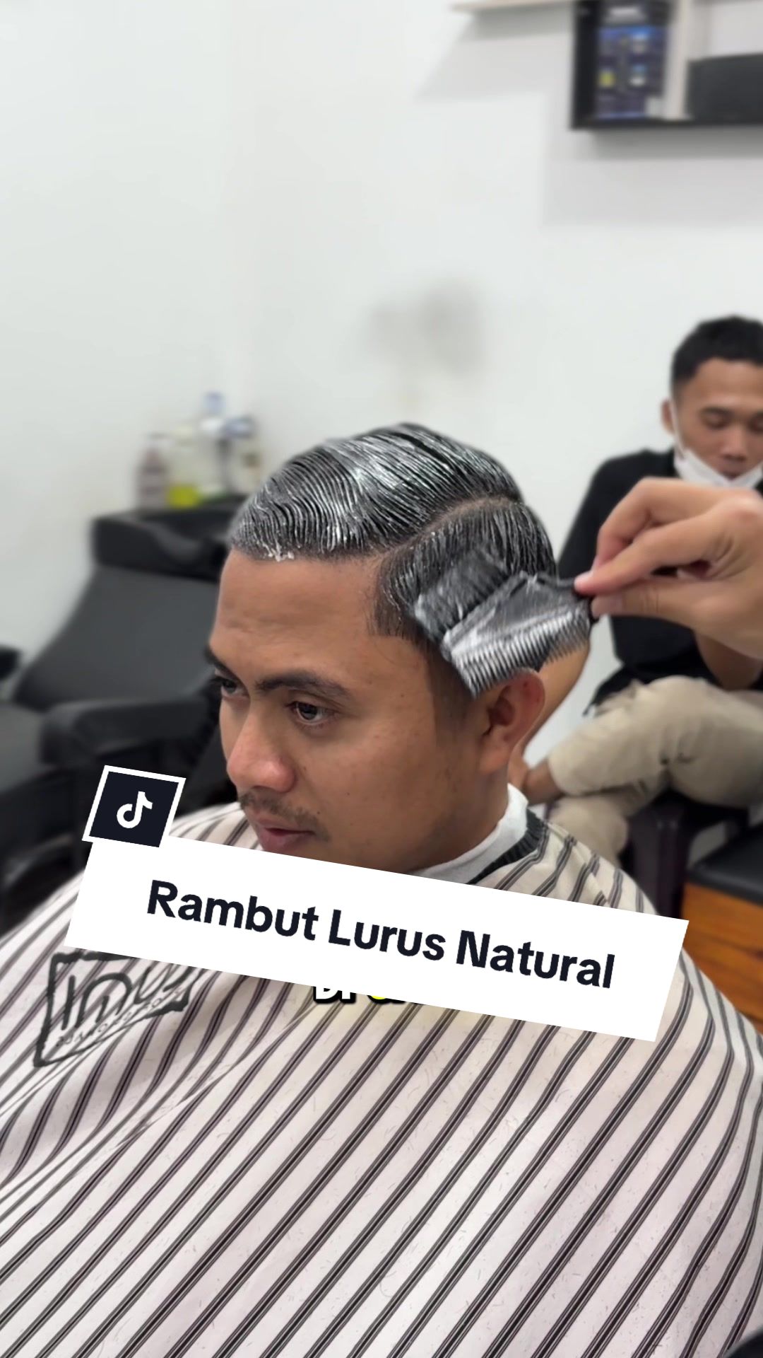TikTok post by @d_cutbarber for Cave Men's Grooming. Caption reads: [...] #rambutikal #downperm @CAVE Men's Grooming.