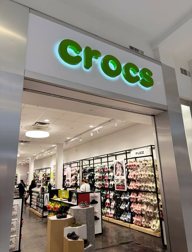 Instagram post by @clovermom_coygirl for collAble. Caption reads: [...] long. link in my bio! @crocs #crocs....