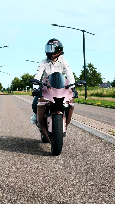Instagram post by @motor.chick for XLMOTO. Caption reads: [...] helmet from @ravensportsofficialonroad....