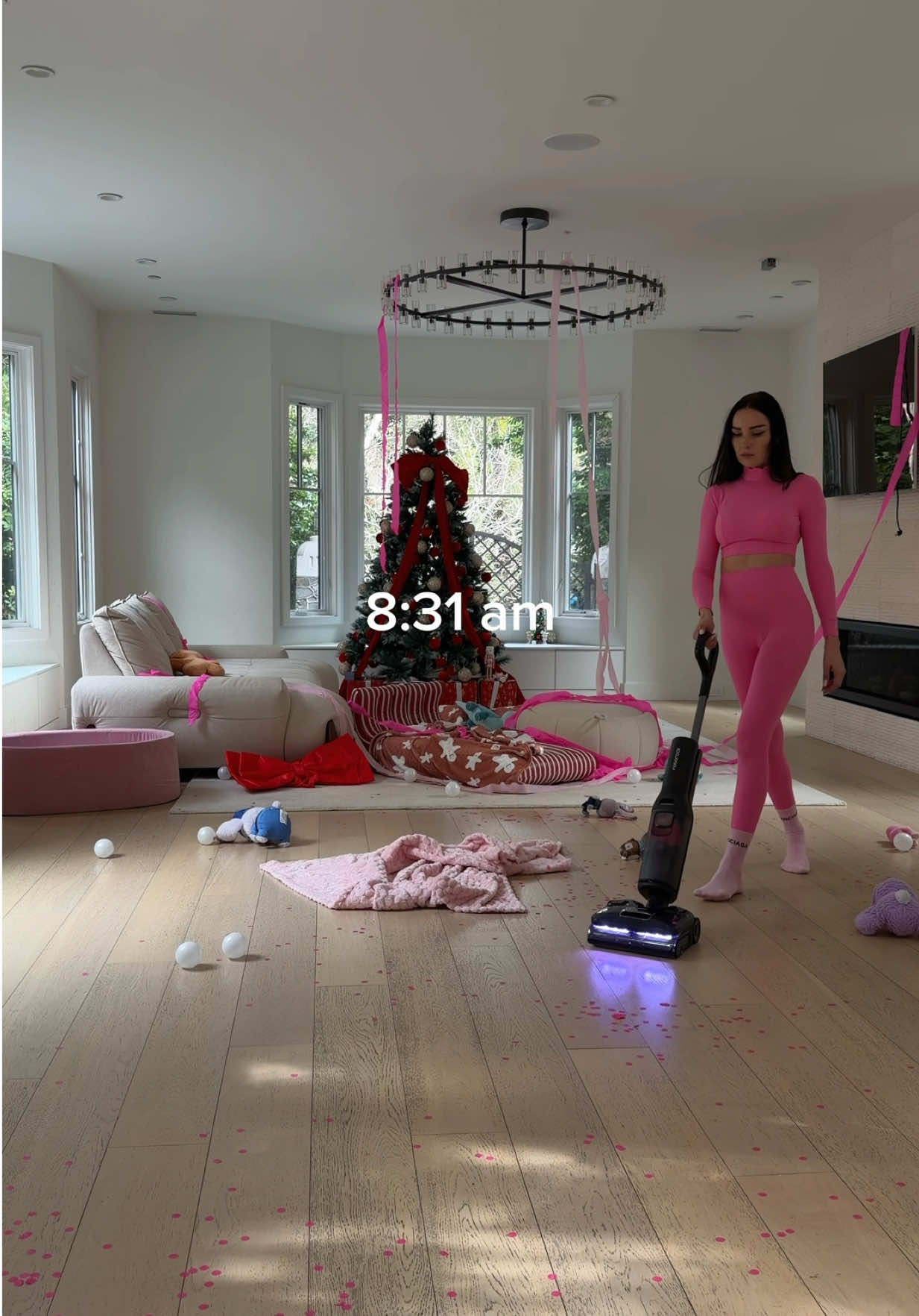 TikTok post by @annatwinsies for Roborock. Caption reads: [...] sticky spills 🙈🫠 Luckily I have my....