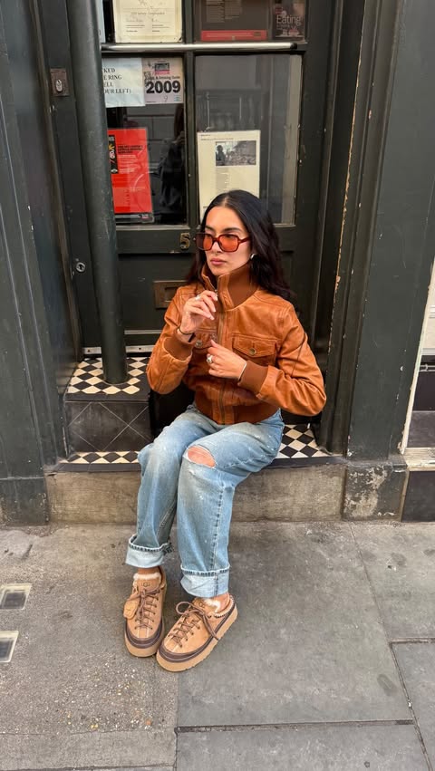 Instagram post by @soooffffiiaaa for schuh. Caption reads: [...] out in my new UGG Heritage Lace-ups ☁️....