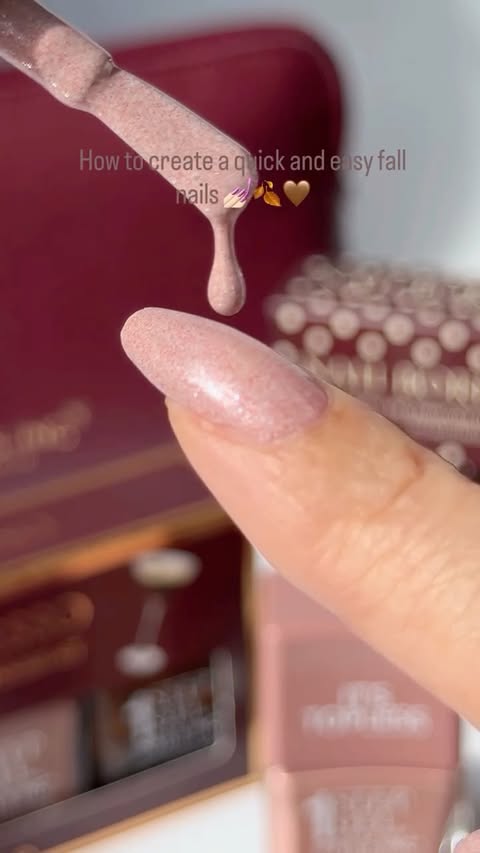 Instagram post by @fromsandyxo for Nails.INC. Caption reads: [...] chic fall mani at home 🍂💅🏻🤎 Using....
