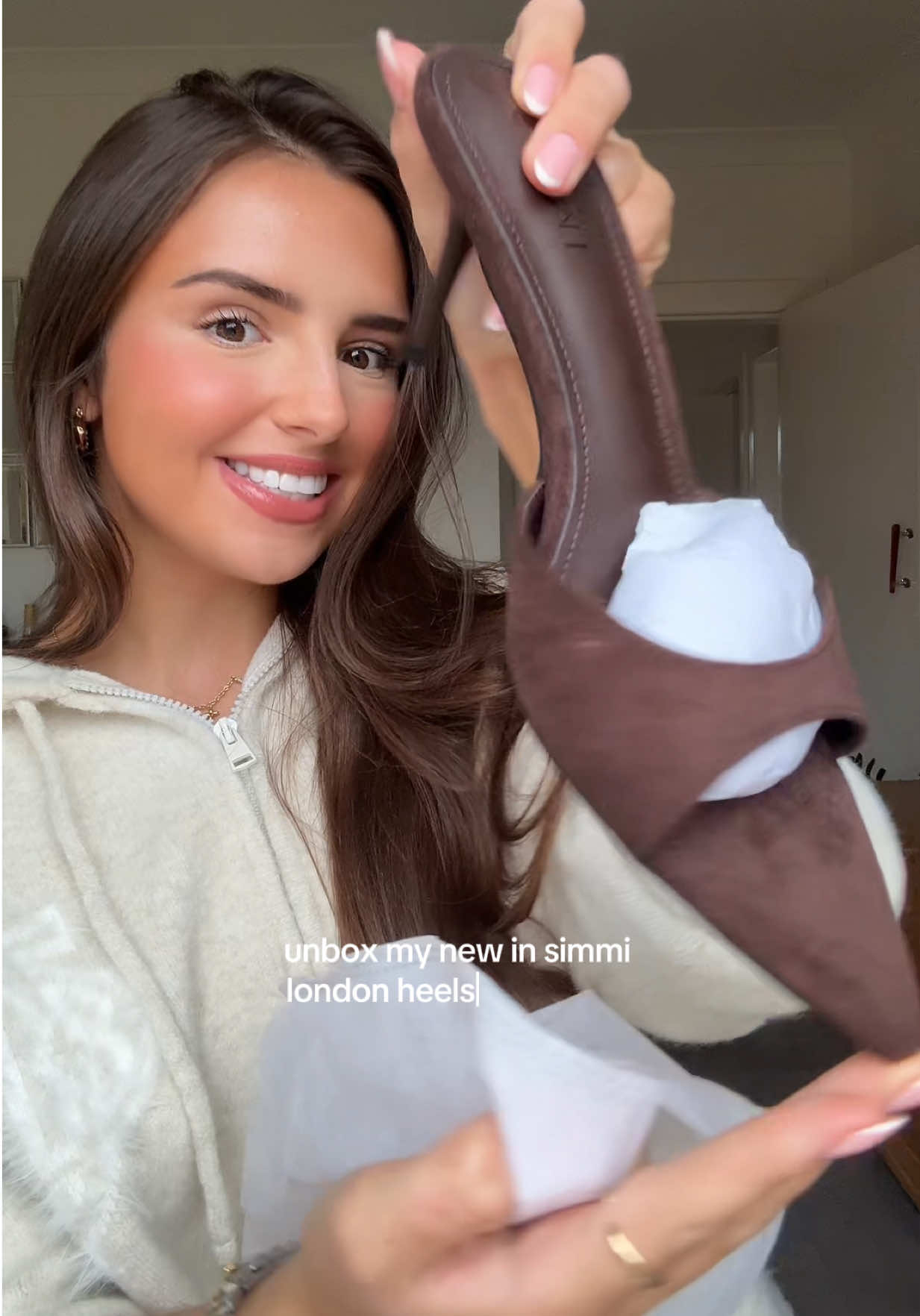 TikTok post by @summerchristiee4 for Simmi London. Caption reads: unbox my new @SIMMILONDON winter heels with me!✨🤎....