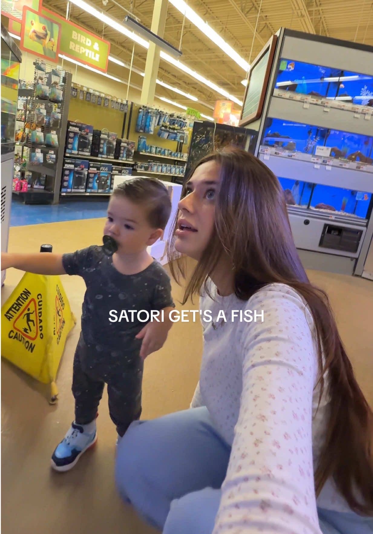 TikTok post by @_the1stnoel for Petco. Caption reads: just a boy & his 1st fish 🥲 MY SHAYLAAAA! relax....