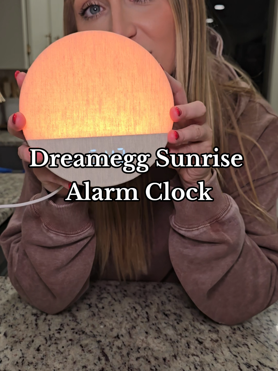 TikTok post by @hannahshealthyfit for Dreamegg. Caption reads: Sunrise Alarm Clock ⏰️ by @Dreamegg #alarmclock....