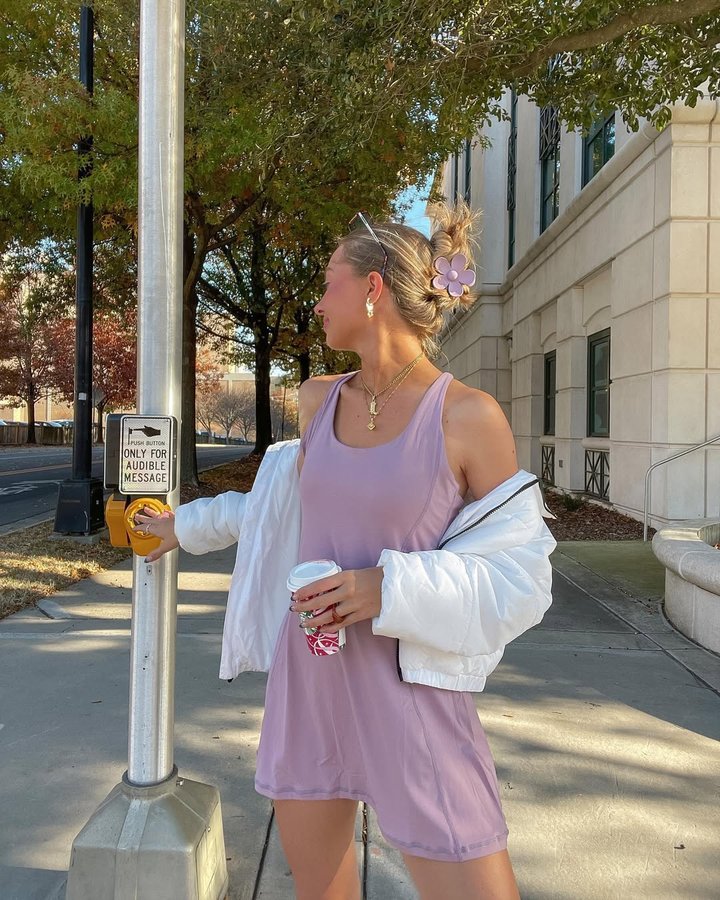 Instagram post by @jennibrhodes for GOLD HINGE. Caption reads: [...] stroll around town 🚏💜🏙🚆 wearing....