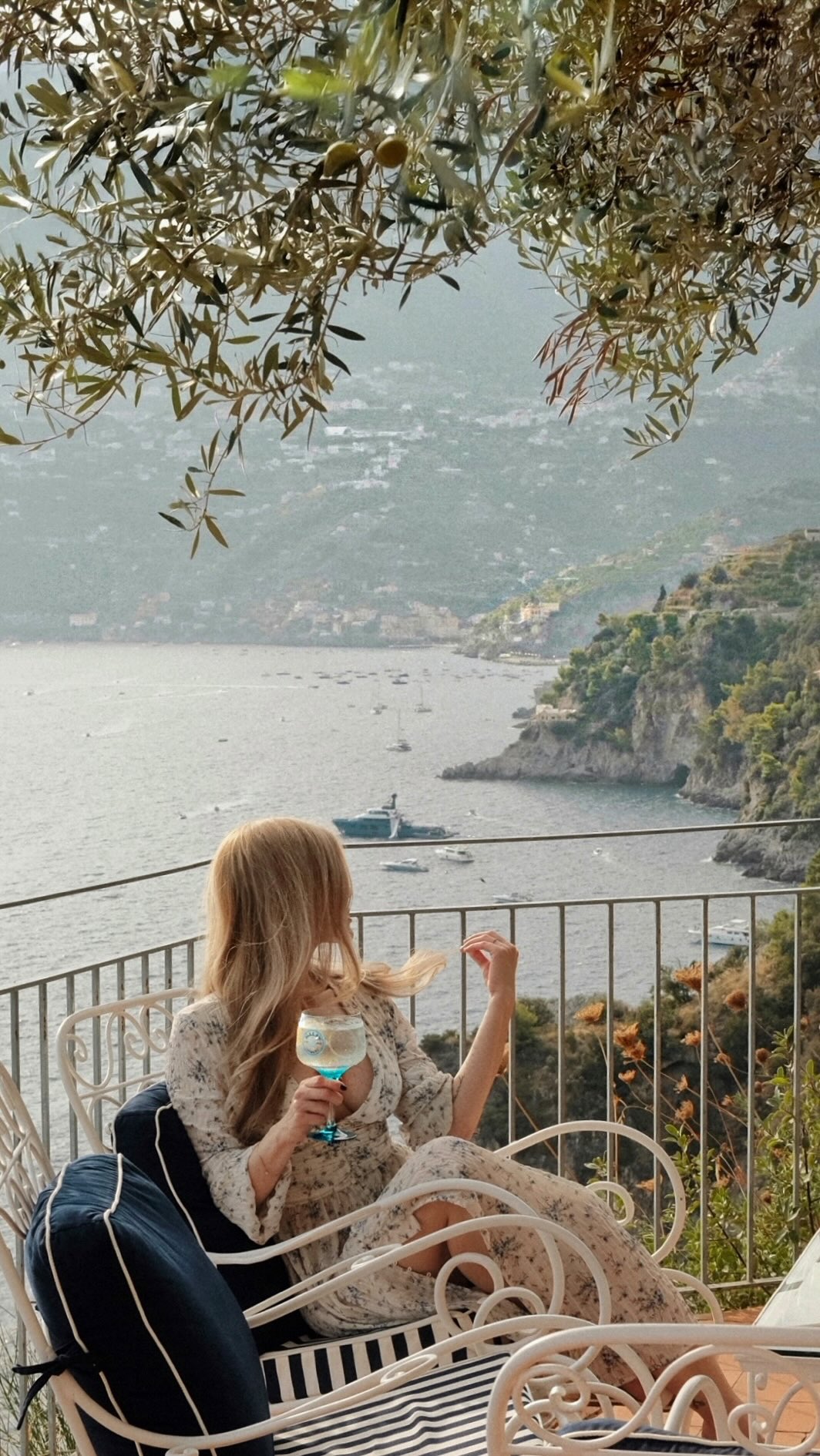 Instagram post by @blondebedouin for MALFY Gin. Caption reads: #MalfyMoments An unforgettable stay at La Torre....