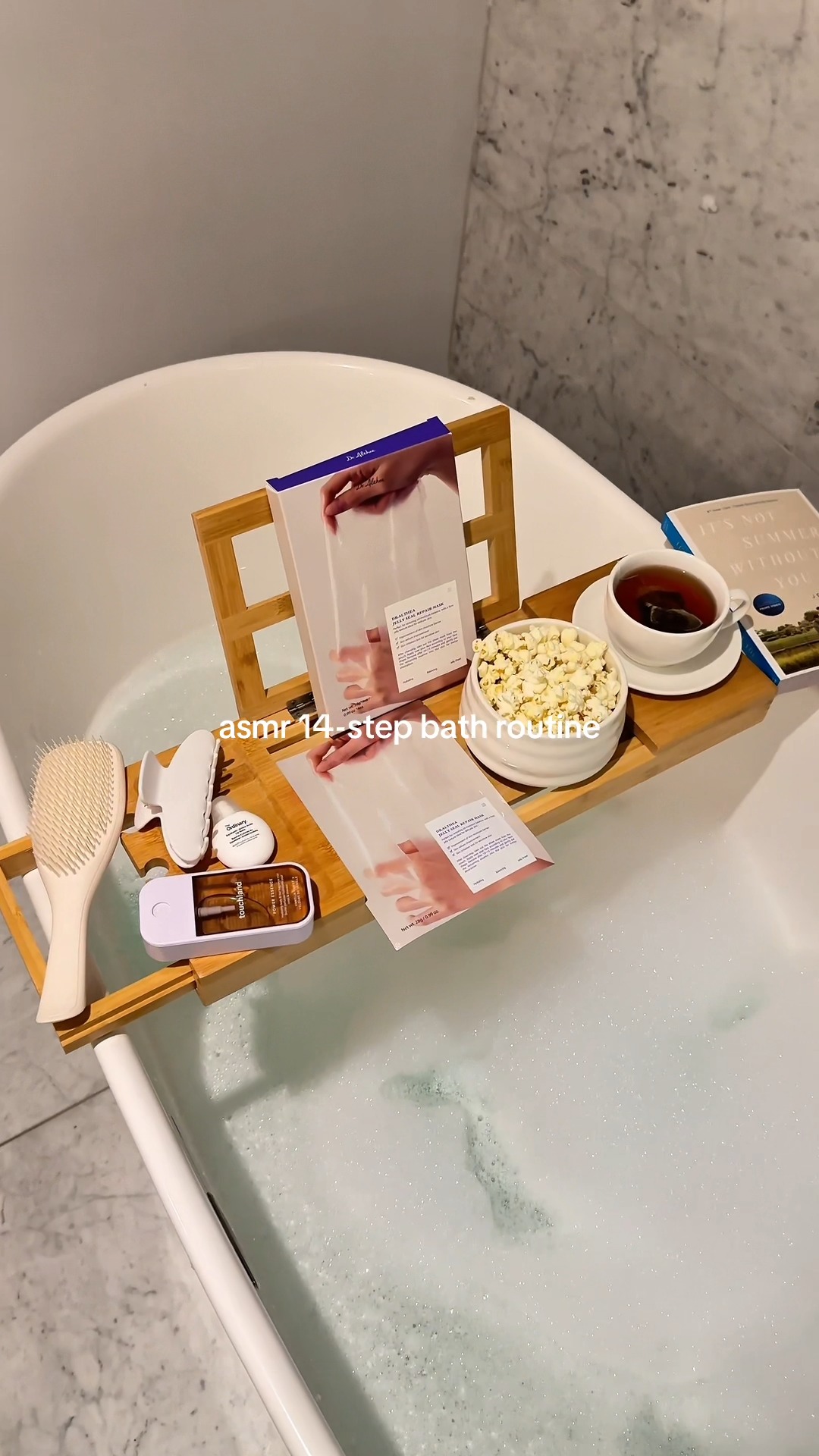 Instagram post by @galiciagordon for Touchland. Caption reads: #DrAltheaPartner asmr 14-step bath routine ft.....