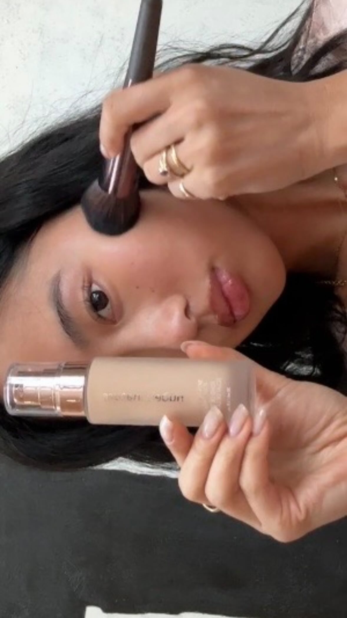 Instagram post by @emilyquach for Nude by Nature. Caption reads: @nudebynature on rotation all weekend long AD....