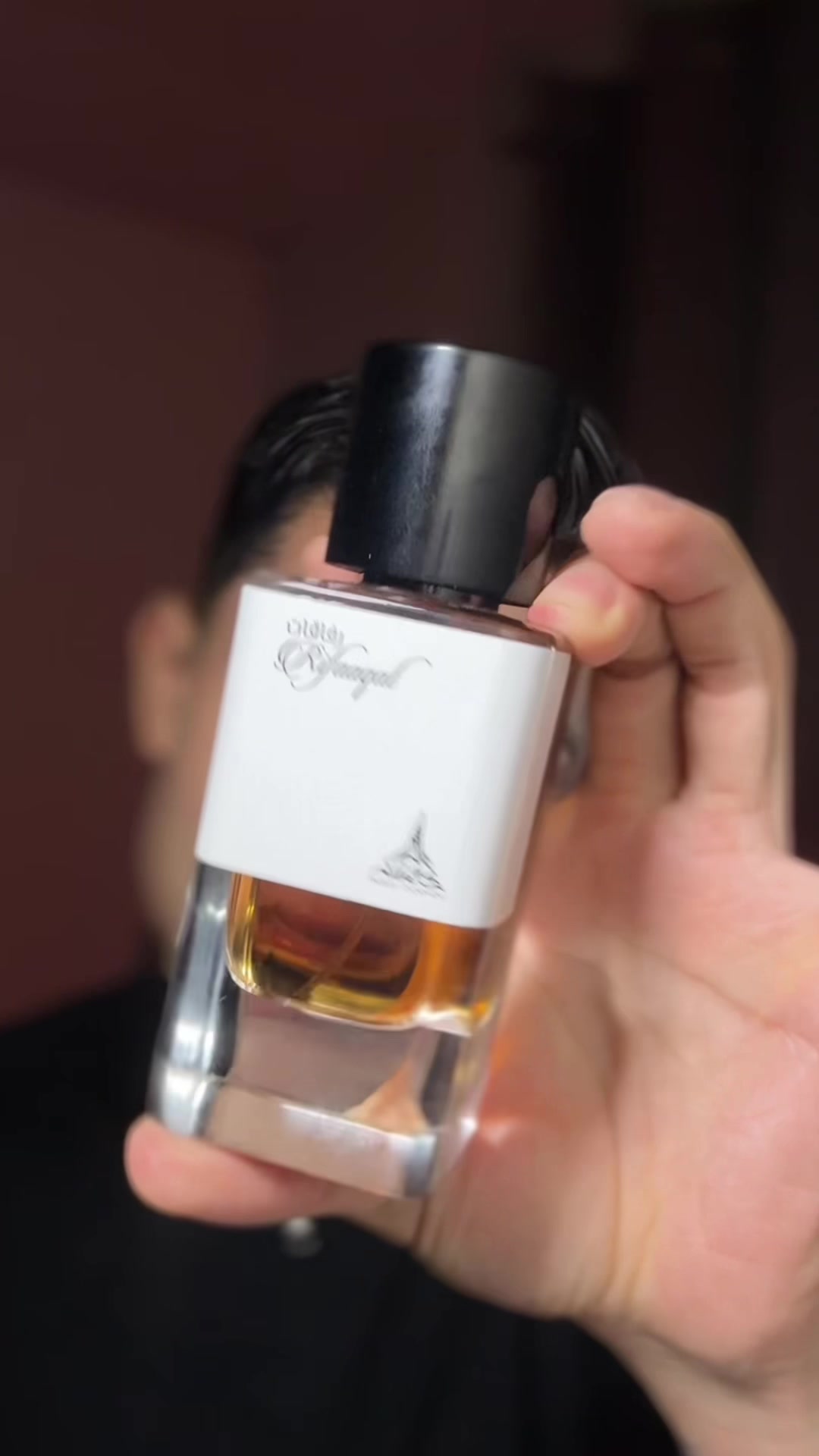 TikTok post by @riveraaak for Paris Corner Perfumes. Caption reads: BABYCAT YSL DUPE • Rifaaqat by @Paris Corner....