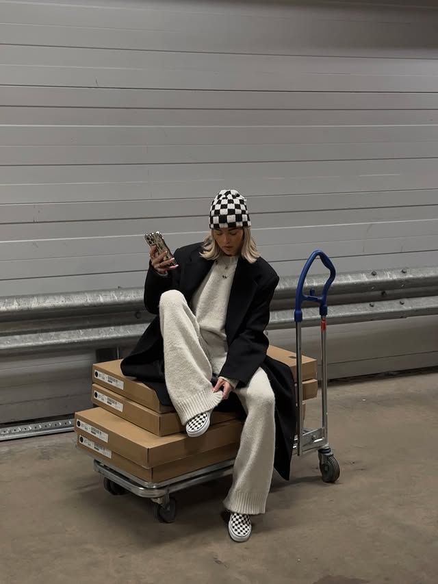 Instagram post by an influencer for The Couture Club. Caption reads: Check mate ♟️ Full fit: @thecoutureclub (& their....