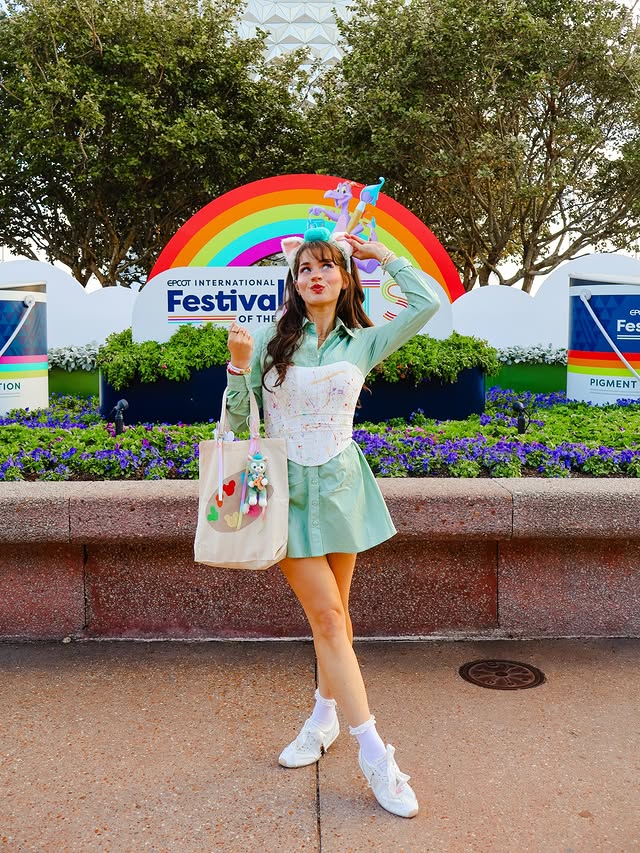 Instagram post by @magicwithmeg for Undercover Tourist. Caption reads: festival of the arts girl 4ever 🎨✨💚 it just felt....