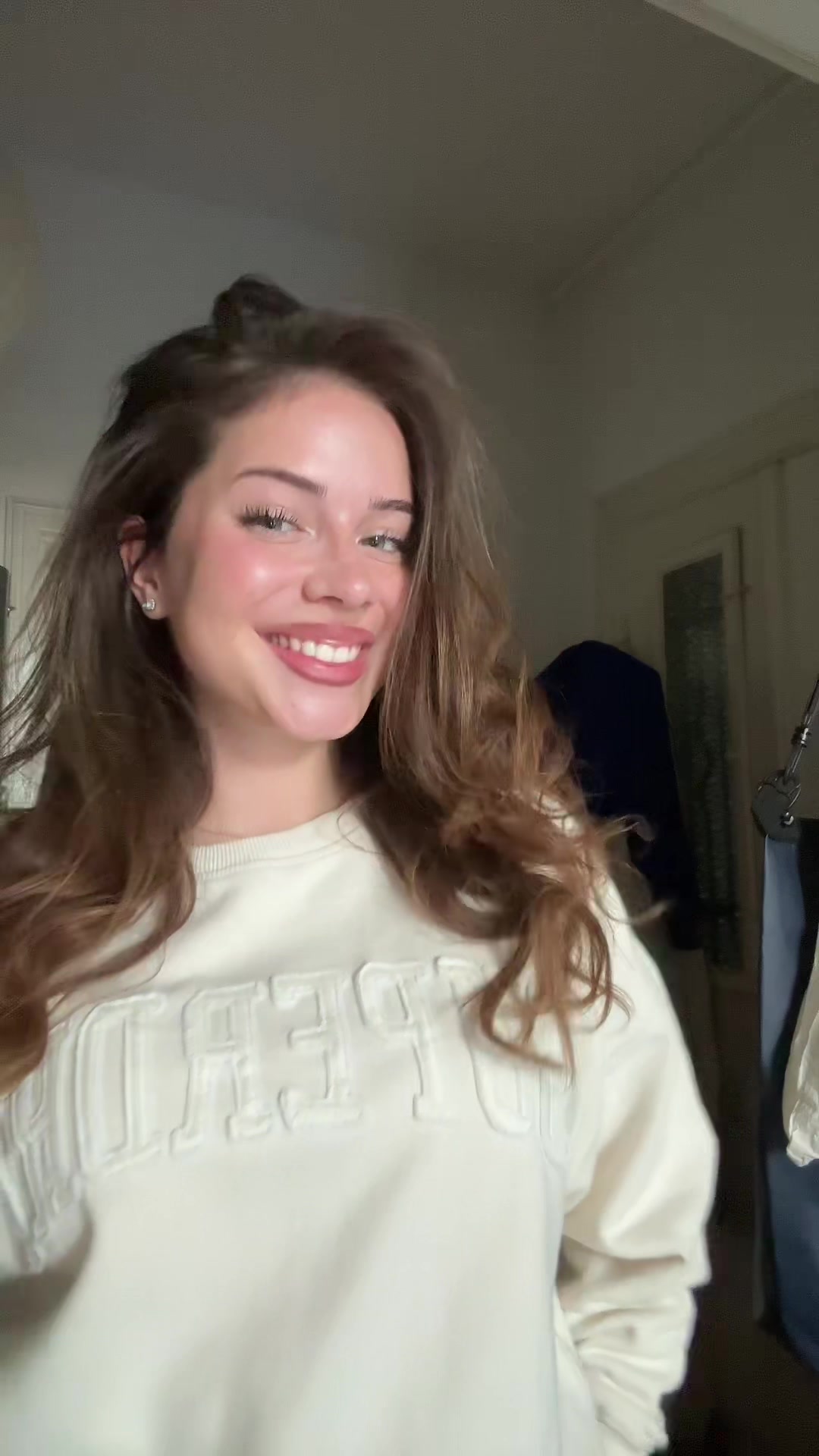 TikTok post by @emmaldkkk for Superdry. Caption reads: whole fit from @CULT by Superdry except the cat.