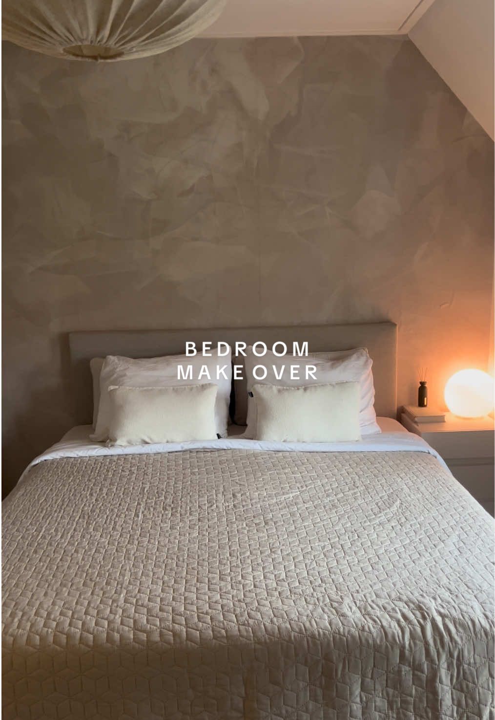 TikTok post by @siefshome for Photowall. Caption reads: [...]   This peel & stick wallpaper from....