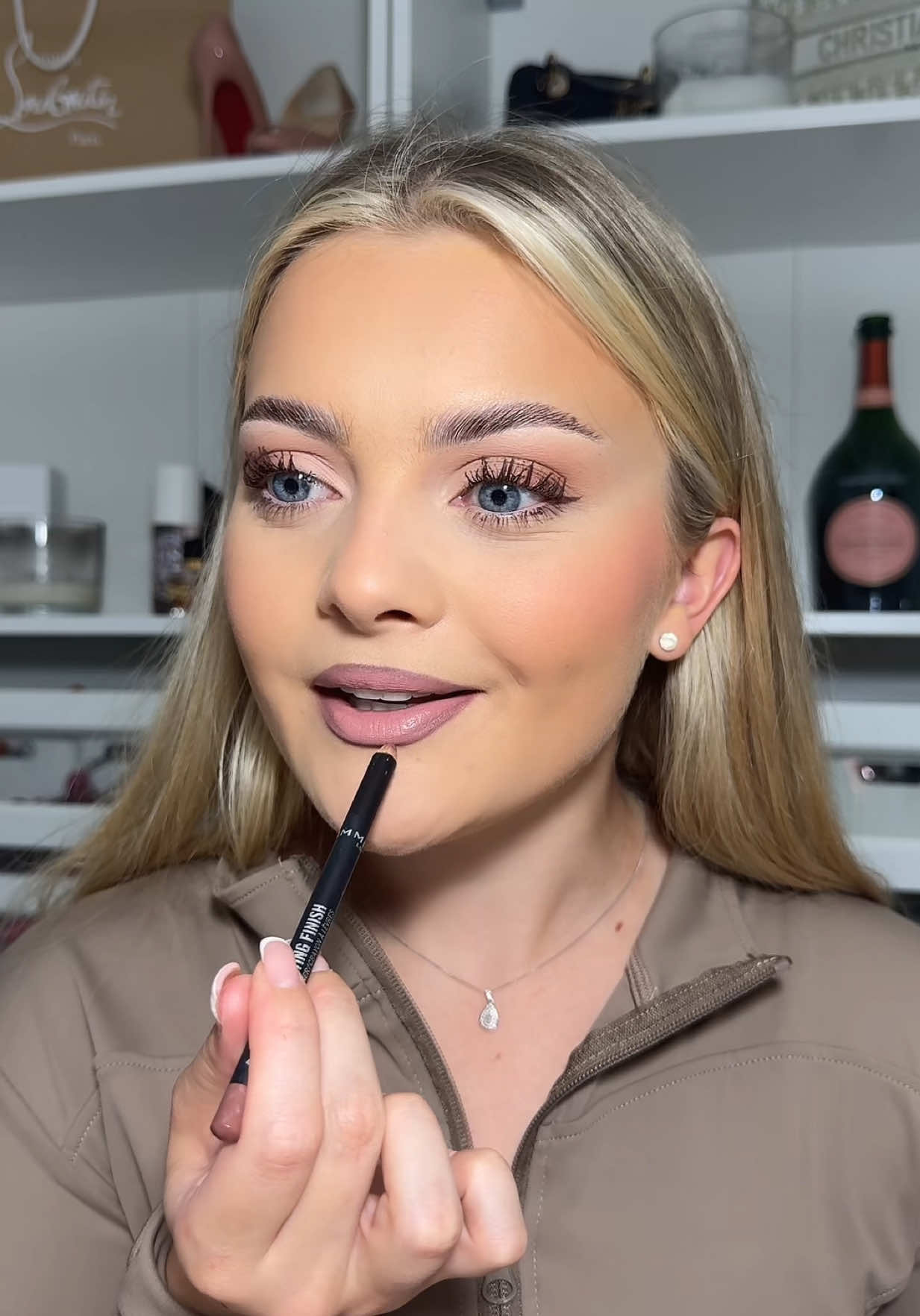 TikTok post by @kristywebley for rimmellondon. Caption reads: Coffee lashes for the win🧋 AD @rimmellondon....