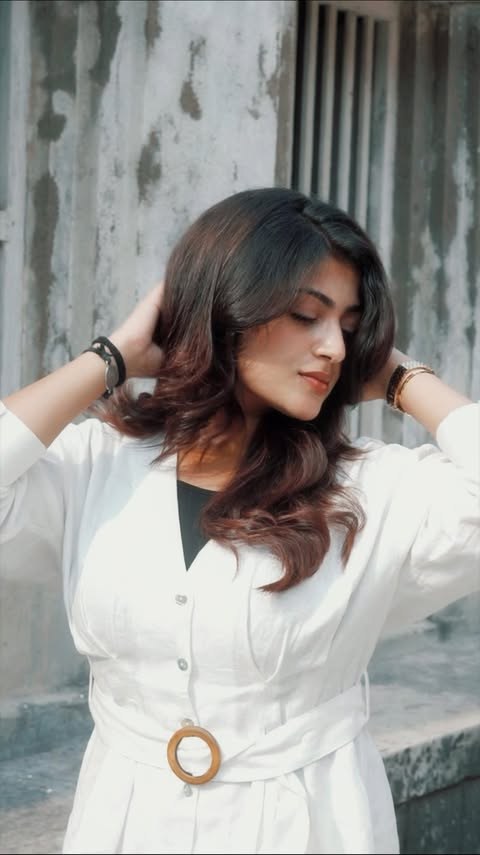 Instagram post by @miss_triparna for Nihar Naturals. Caption reads: [...] thick, and strong it feels with Nihar....