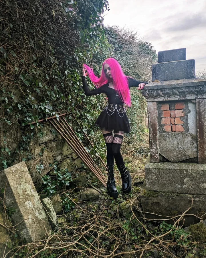 Instagram post by @xdemidoomx for VampireFreaks. Caption reads: [...] 𝖎𝖙 𝖇𝖆𝖇𝖞 🪦🖤 Socks gifted from....