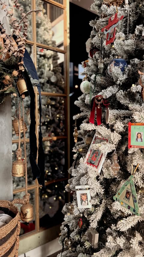 Instagram post by @houseofheron for King of Christmas. Caption reads: Every year when we pull out our ornament bin, I’m....