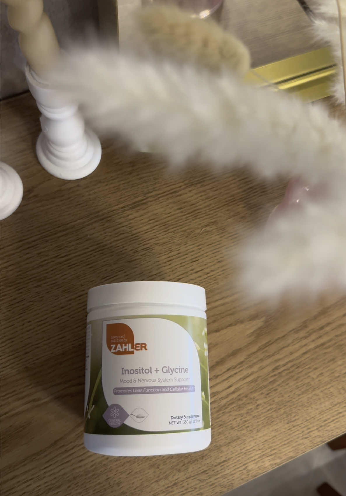 TikTok post by @life.as.eda4 for Zahler Nutrition. Caption reads: Struggling with hormonal balance or mood swings?....