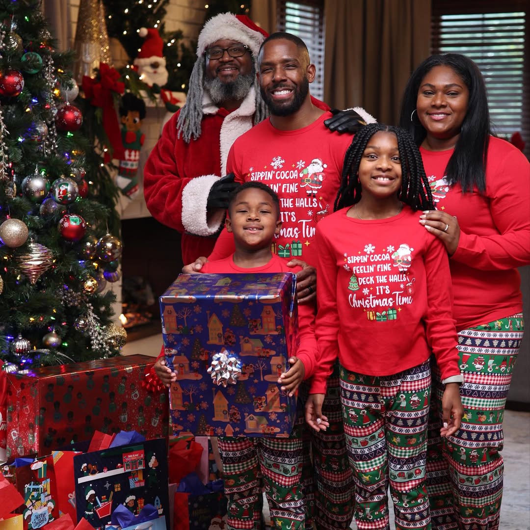 Instagram post by @robertsecond53 for Dollar General. Caption reads: Matching Christmas pajamas with Black Santa?!....
