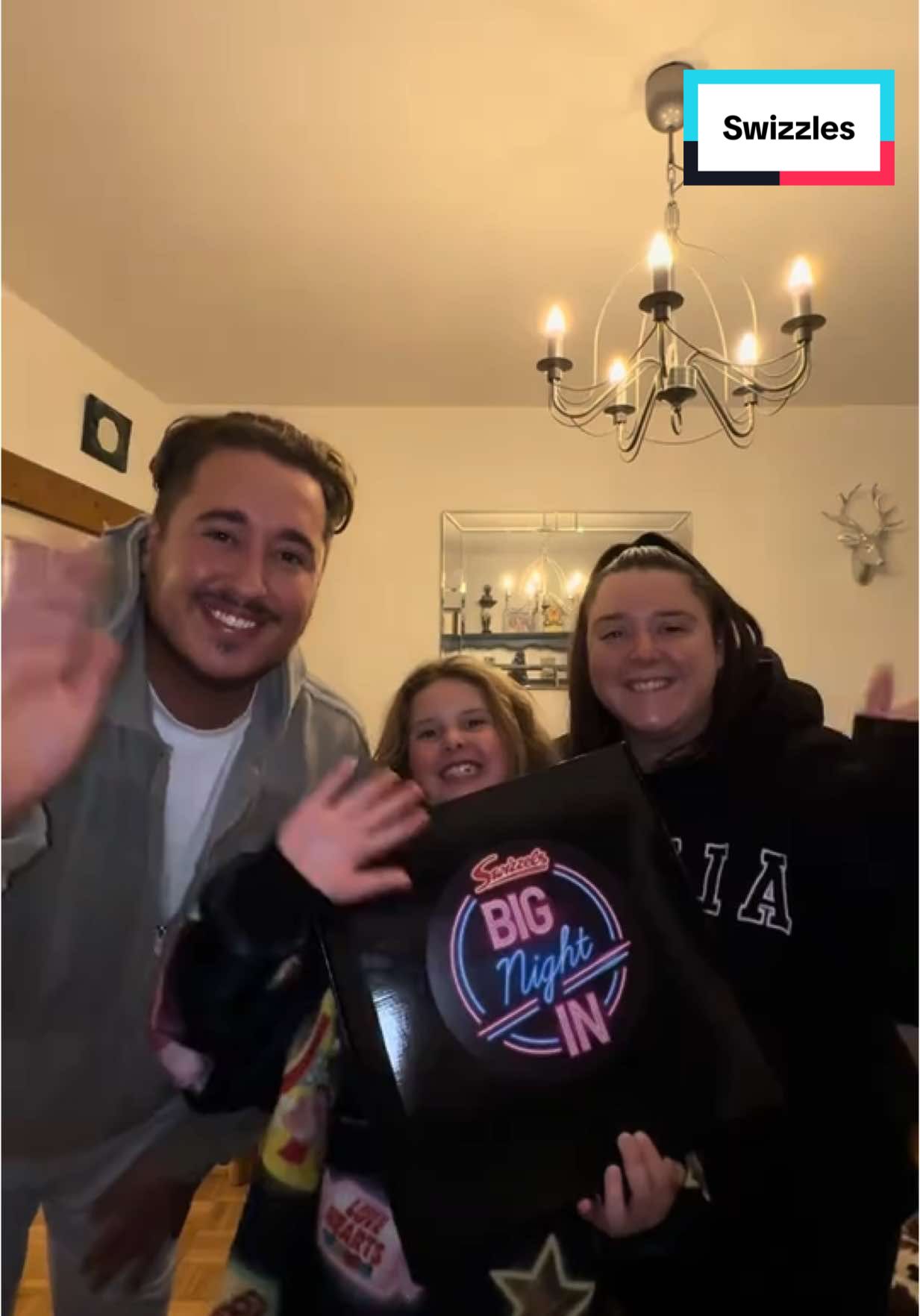 TikTok post by @corysworldd for Swizzels. Caption reads: AD The perfect night in with @Swizzels....