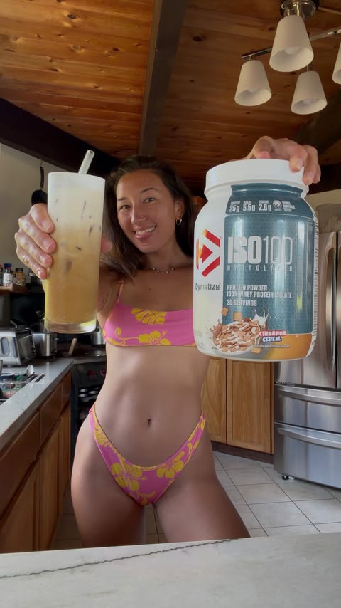 Instagram post by @sally.cohen for Dymatize. Caption reads: #ad Coffee, @dymatize ISO100 protein, and surf is....
