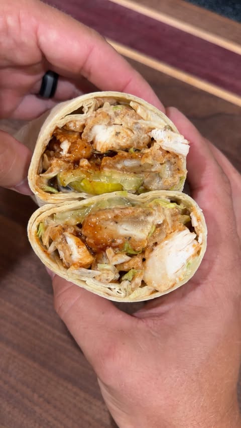 Instagram post by @michiganbbqguy for Dan-O's Seasoning. Caption reads: Nashville Hot Chicken wraps with @danosseasoning....