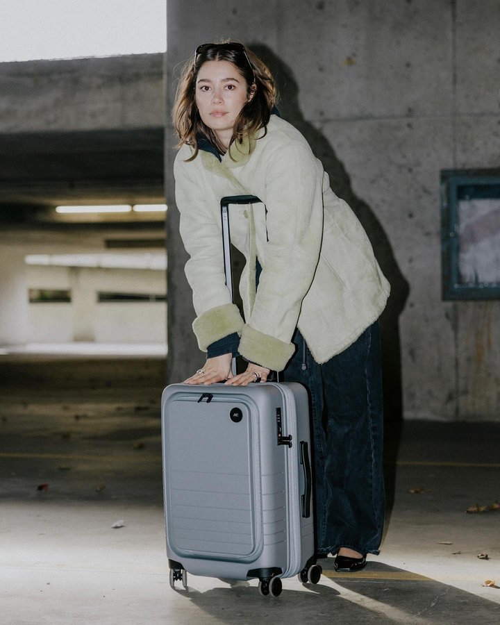 Instagram post by @graymatsen for Monos. Caption reads: 🔊🌐 🏷️🛄 💺everyone knows i <3  @monostravel....