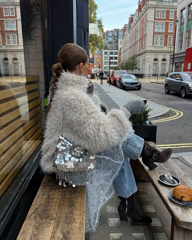 Instagram post by @whatgigiwears for Free People. Caption reads: Sparkle season is here @freepeopleeu ad.