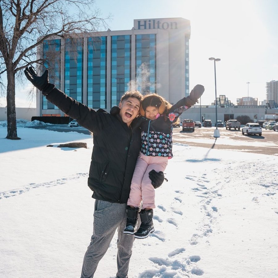 Instagram post by @nikovaldes for Hilton Hotels & Resorts. Caption reads: Our Father Daughter Trips Are The Best Times Of....