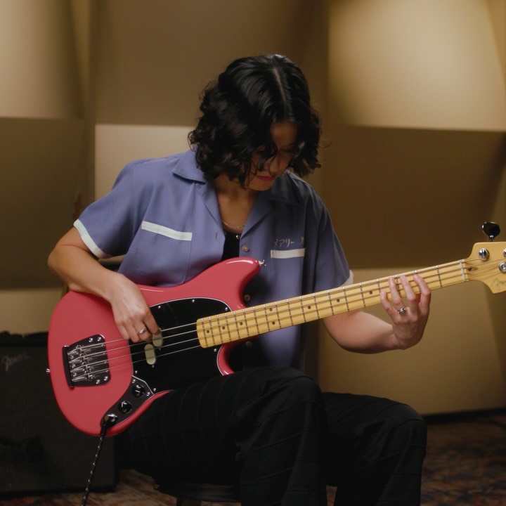 Instagram post by @camillabasskilla for Fender. Caption reads: The new American Professional Classic Mustang Bass....