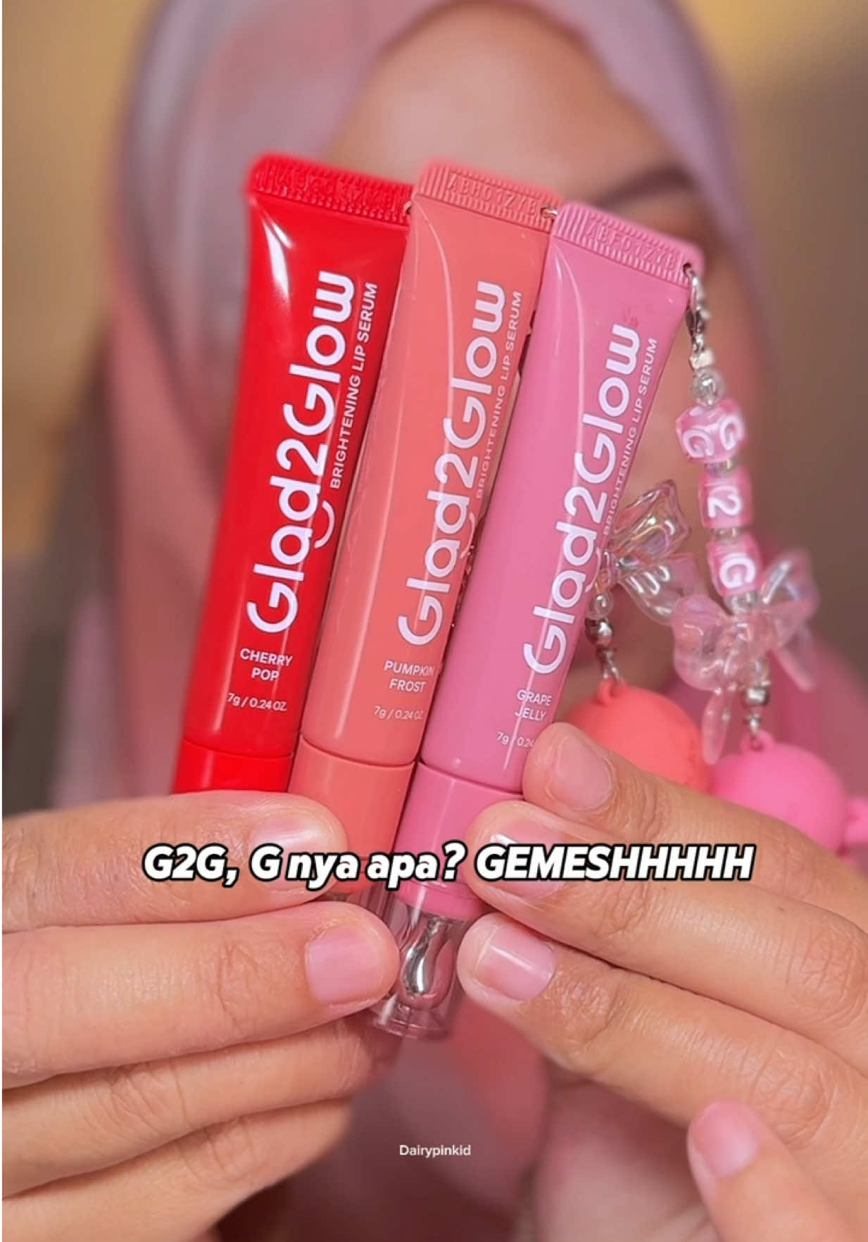 TikTok post by @dairypinkid for Glad2Glow Indonesia. Caption reads: Lip serum g2g glad2glow @glad2glow.indo punya new....