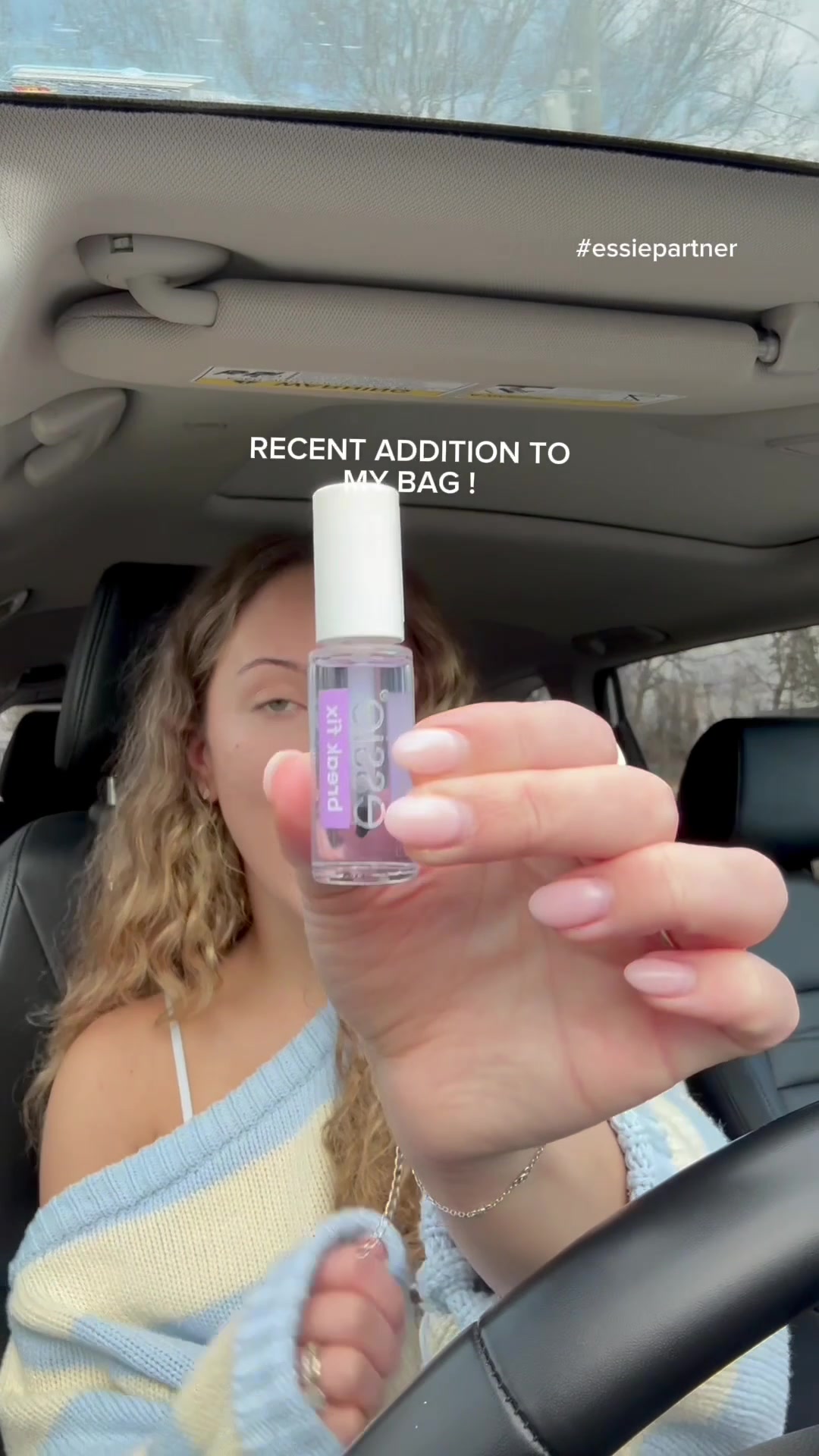 TikTok post by @annadawnphillips for essie. Caption reads: [...] me with a broken nail again thanks to @essie....