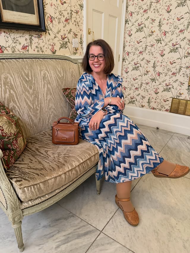 Instagram post by @whoisthatlondonmum for Blue Vanilla. Caption reads: Feeling fabulous in @bluevanillaofficial The dress....