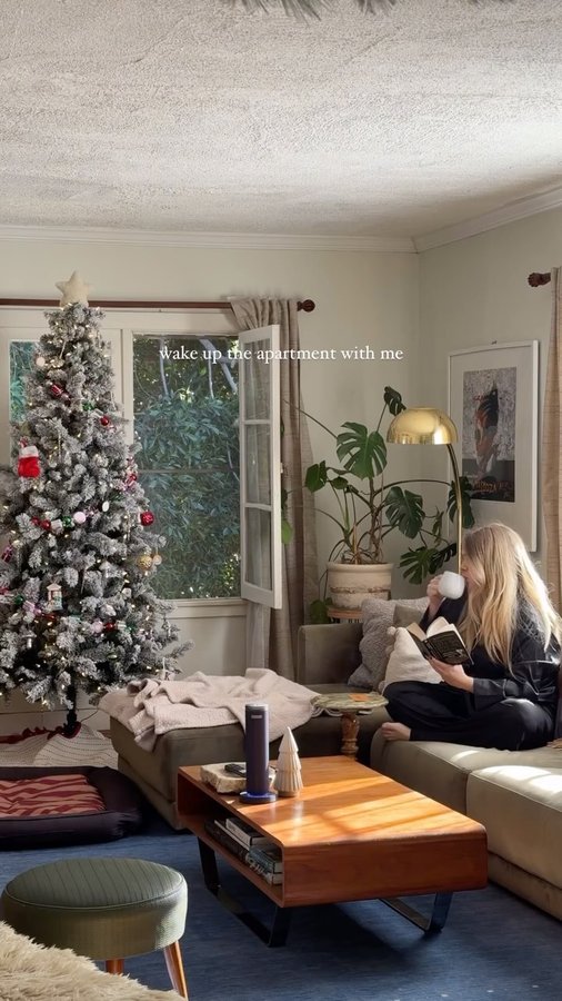 Instagram post by @highboyla for Homedics. Caption reads: Waking up the apartment is a self care ritual for....