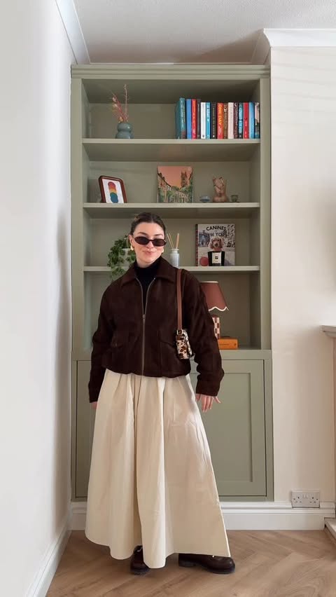 Instagram post by @ambstorey for Make My Lemonade. Caption reads: [...] skirt @asos sunglasses @hm Loafers*....