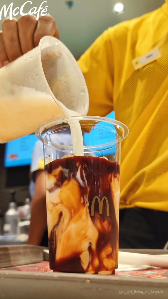 Instagram post by @a_girl_living_in_fairytale for McDonald's India. Caption reads: 𝖬𝖢𝖣𝖮𝖭𝖠𝖫𝖣'𝖲 × 𝖢𝖮𝖫𝖫𝖠𝖡𝖮𝖱𝖠𝖳𝖨𝖮𝖭....