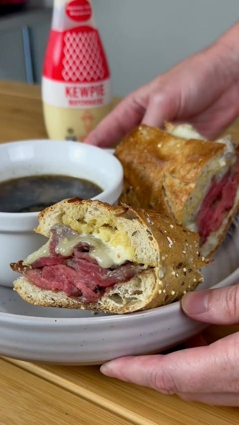 Instagram post by @thembitesrecipes for Kewpie. Caption reads: #ad - A California French Dip with Kewpie....