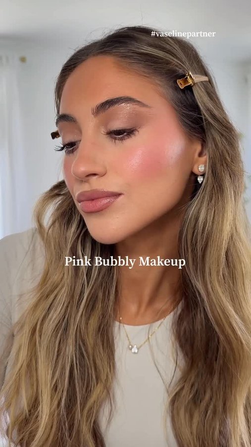 Instagram post by an influencer for Vaseline US. Caption reads: pink bubbly makeup❄️🎀 Inspired by @vaselinebrand....