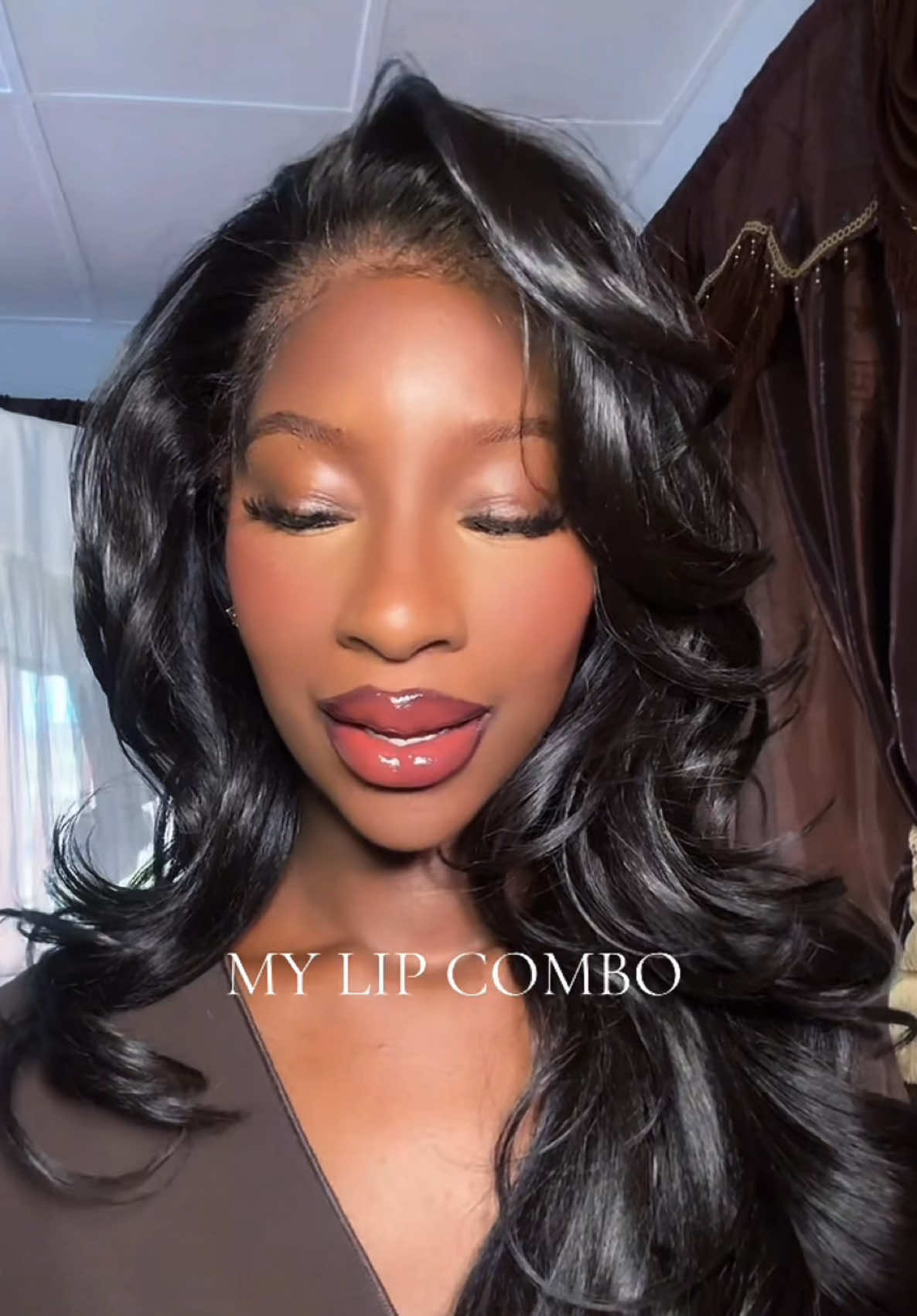 TikTok post by @_minkeit for Outre. Caption reads: [...] Milano gloss. Hair is MH139(Color 2) by....