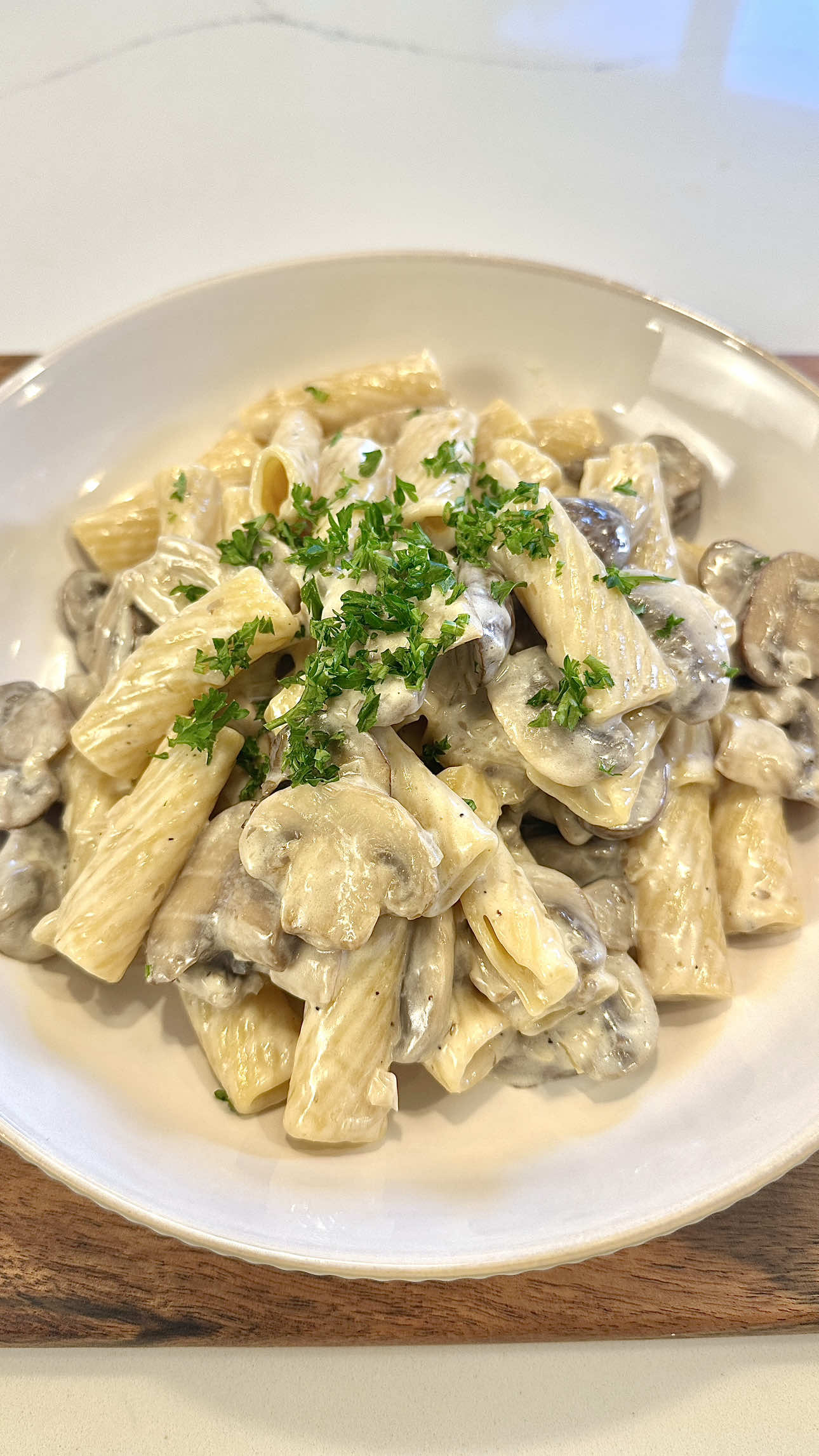 TikTok post by @johnandchelseaa for Barilla. Caption reads: My wife was craving Creamy Mushroom Pasta for....