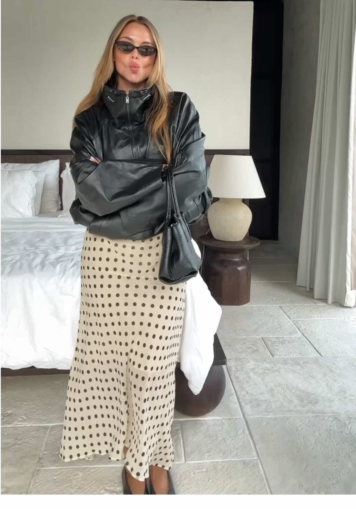TikTok post by @vivianhoorn for H&M. Caption reads: [...] wardrobe and welcoming the new Spring @H&M....