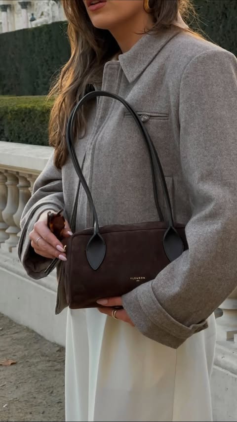 Instagram post by an influencer for FLEURON. Caption reads: Took my new @fleuron.paris bag for a walk🤎 [...].