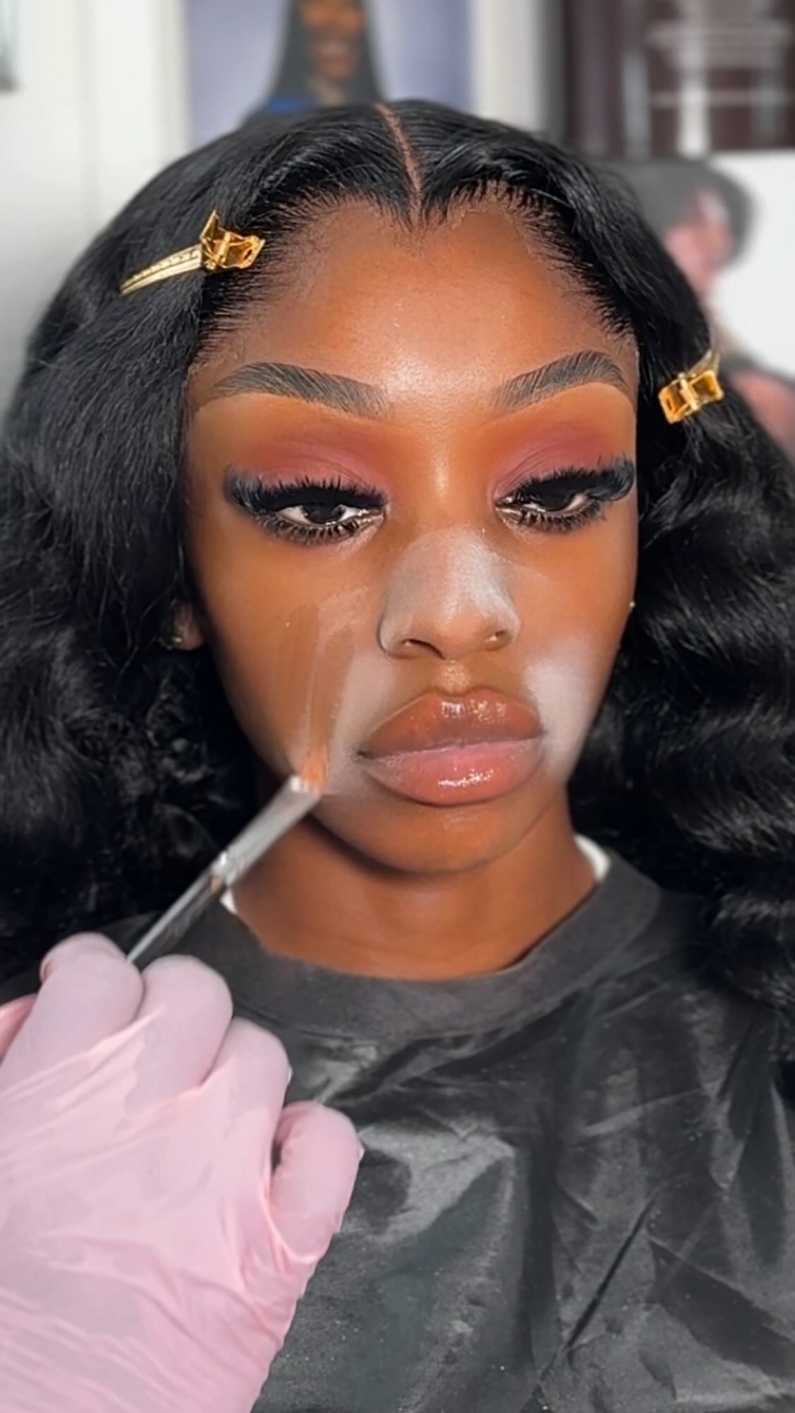 Instagram post by @slay_by_tee for RCMA Makeup. Caption reads: The secret to a flawless finish? It’s ALL in the....