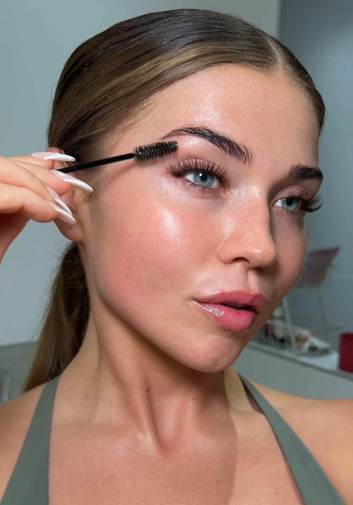 TikTok post by @mollyjacksmakeup for TATTI LASHES. Caption reads: Replying to @niccccc @TATTI LASHES putting my....