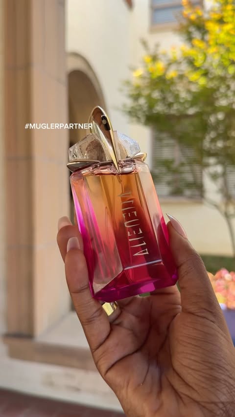 Instagram post by @sydneycarmichaelll for Mugler. Caption reads: #muglerpartner #fragrance #alienpulpBTS Not [...].