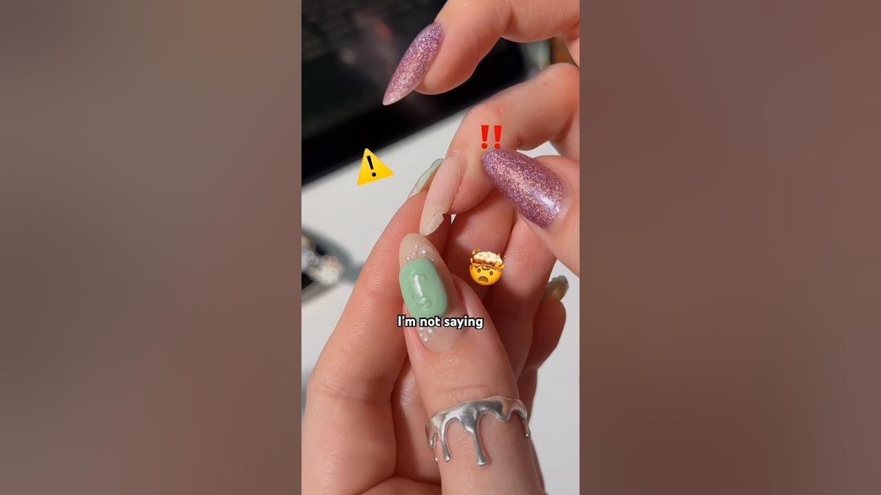 YouTube post by @thegraytergood for Holo Taco. Caption reads: broken nail update 😰🤦‍♀️💅 #nails #broken....
