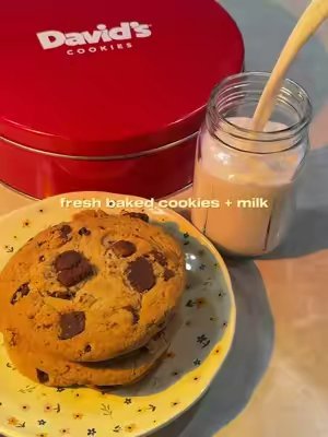 TikTok post by @joycefoodtravel for David's Cookies. Caption reads: [...] for 20% OFF your next order. @David's....